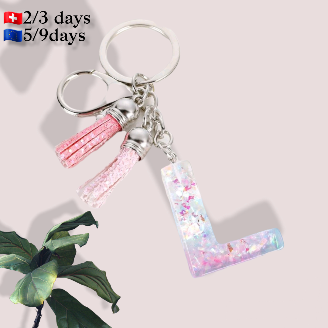 Llavero Letra L | KeychainLlavero con letra efecto 3D Este llavero es perfecto para regalar con detalles que no pasaran desapercibidos. Organiza tus llaves con este precioso llavero con letra acrílica de efecto 3D en tonos rosa y gold. Características: Co