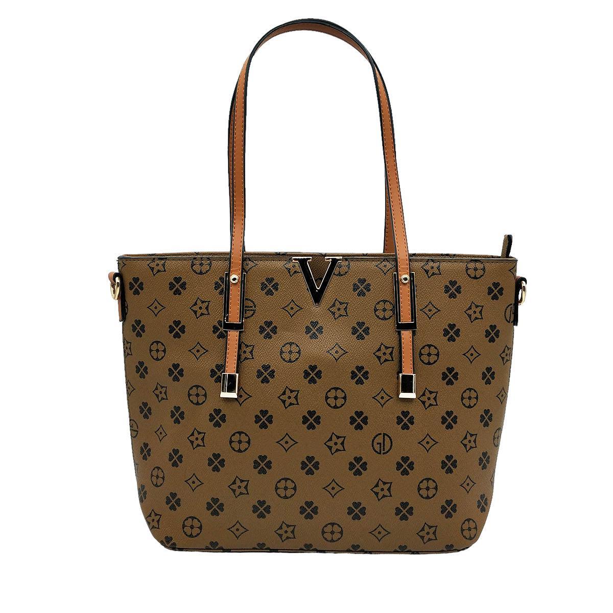 Bolso Tote Bag Flores - Eco pielBolso flores eco piel Bolso de estilo exclusivo, es el compañero ideal para tus ajetreados días. Confeccionado en eco piel, su practicidad y comodidad te permitirán llevar todo lo necesario sin preocupaciones. Un diseño sof