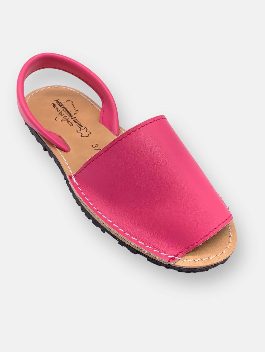 Menorquinas Fucsia Piel - Hechas en EspañaMenorquinas, abarcas, ibicencas, mallorquinas... Como quiera que las llames, estas sandalias son el punto de partida de cada look veraniego. Fabricadas en España con cuero genuino y suela antideslizante. Practicas
