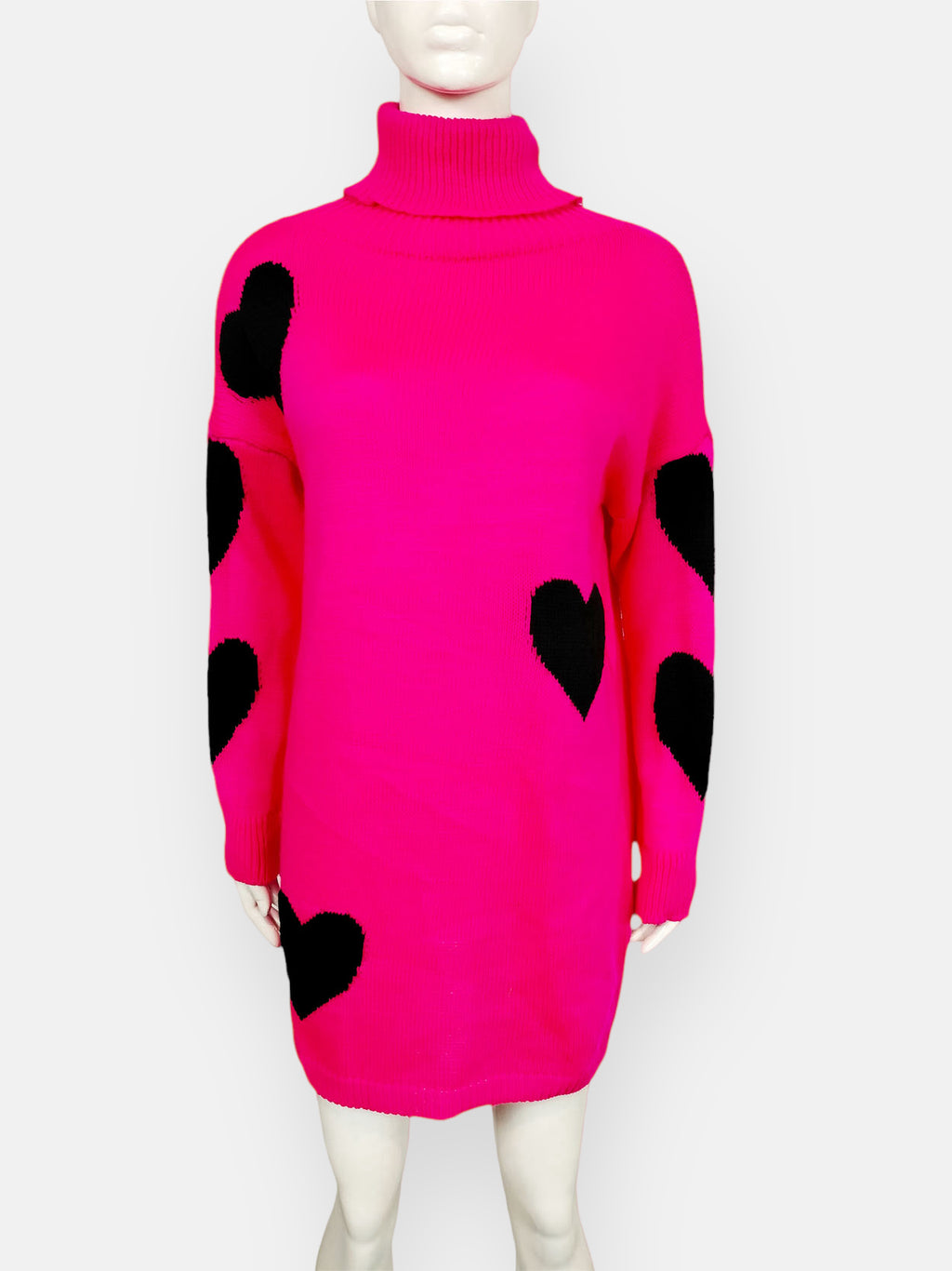 Vestido Punto Corazones- 5 ColoresEste Vestido Punto Corazones es un increíble vestido oversize, con un cuello alto muy cómodo y moderno. Su diseño incluye corazones decorando a contraste, agregando un toque único y diferente. Además, su talla única se ad