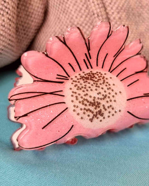 Gancho Cabello Flor Pink | Haarklammer Blumen PinkGancho cabello flor rosa ¡Encantador! El Gancho Cabello Flor Pink te hará lucir única. Eleva tu look con este hermoso diseño de flor, adornado con tonos rosados y brillantinas - ¡tan brillante como el sol!