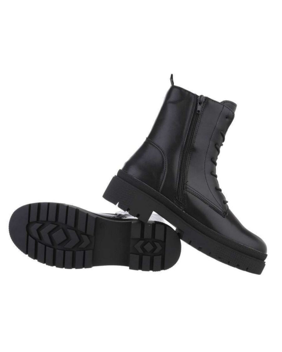 Botin Eco piel Elisa -N°36Este botín ecológico de piel Elisa ofrece una solución para mantener los pies calientes en climas fríos gracias a sus cordones y suela ancha. Cómodo y ligero, es la opción ideal para todo el año. Último talla 36 Envío: Suiza 2/4