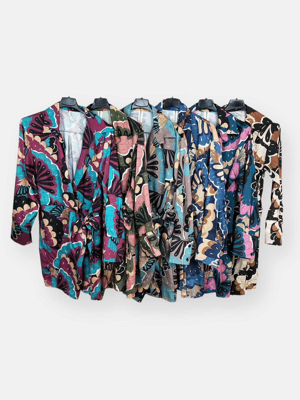 Vestido Fantasia Tendencia | 6 ColoresVestido Fantasia Tendencia Con un escote en V con estampado de fantasía que destaca entre los colores de moda, este vestido te ofrece un estilo único. Resalta tu figura con su cinta que se amarra en la cintura Caracte