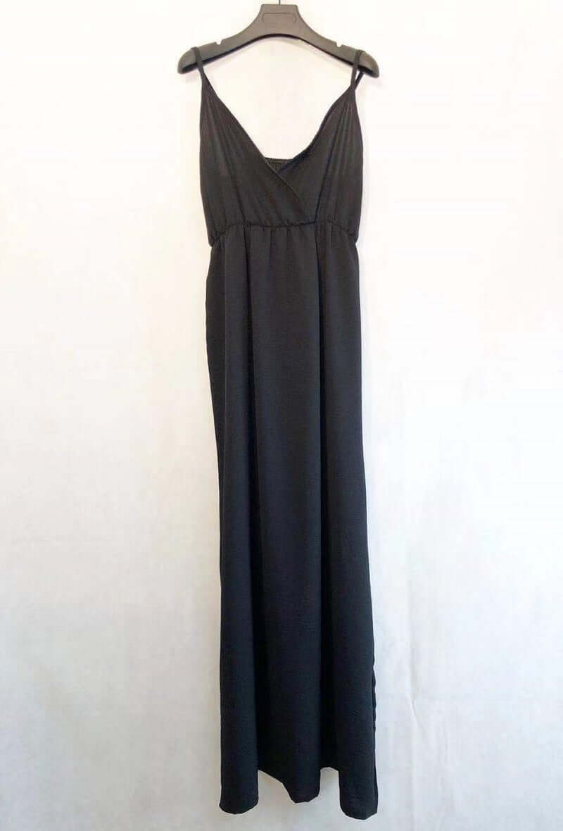 Vestido Largo Tirantes ClaraVestido Largo Tirantes Clara es una prenda elegante y versátil con escote cruzado y tirantes regulables. El color liso y la talla única de S/XL lo hacen adecuado para diversas ocasiones. Disfrute de su comodidad y estilo con es