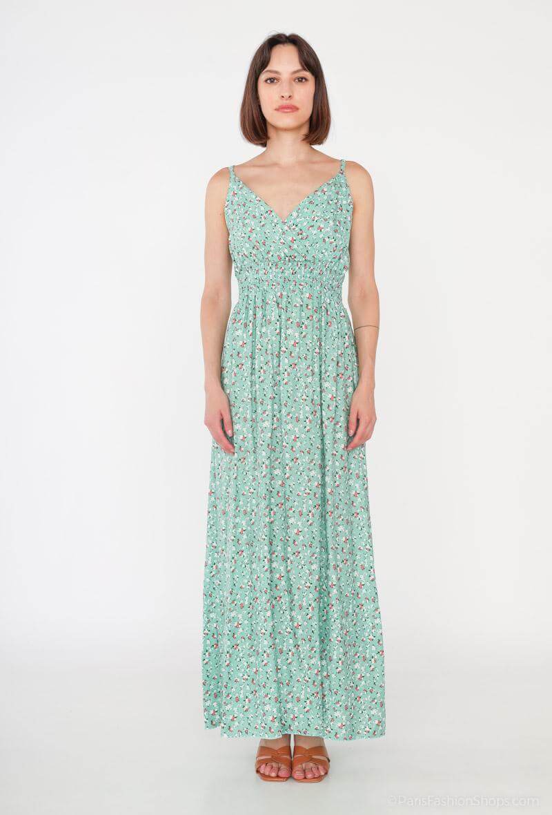 Vestido Glorie Verde 4 coloresVestido Largo Cruzado Glorie El Vestido Glorie Amarillo es una prenda elegante y versátil con un escote cruzado y un estampado de pequeñas flores que lo hacen único. Sus tirantes regulables ofrecen un ajuste perfecto y cómodo