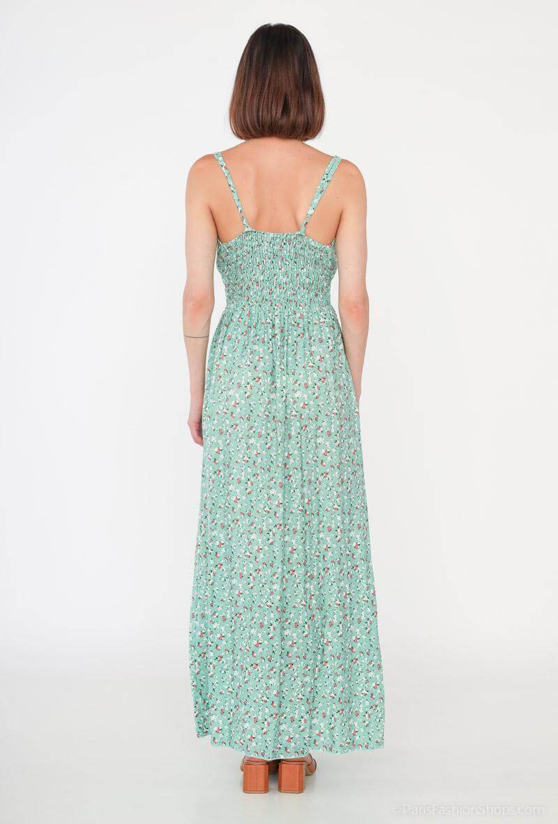 Vestido Glorie Verde 4 coloresVestido Largo Cruzado Glorie El Vestido Glorie Amarillo es una prenda elegante y versátil con un escote cruzado y un estampado de pequeñas flores que lo hacen único. Sus tirantes regulables ofrecen un ajuste perfecto y cómodo