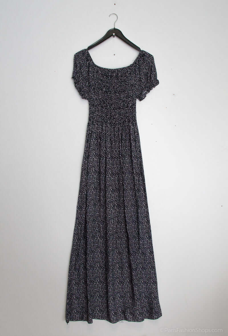 Vestido Fruncido Estampado PortugalUn vestido muy versatil para una mujer sofisticada. Este vestido largo con escote bardot y corte fruncido en la parte superior del top, junto a una falda larga y holgada, te hará lucir elegante y exclusiva. Hecho con 95%