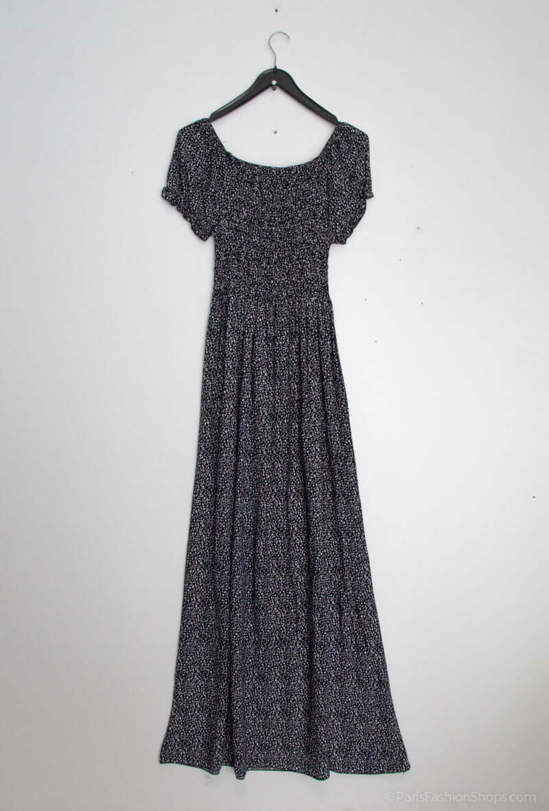 Vestido Fruncido Estampado PortugalUn vestido muy versatil para una mujer sofisticada. Este vestido largo con escote bardot y corte fruncido en la parte superior del top, junto a una falda larga y holgada, te hará lucir elegante y exclusiva. Hecho con 95%