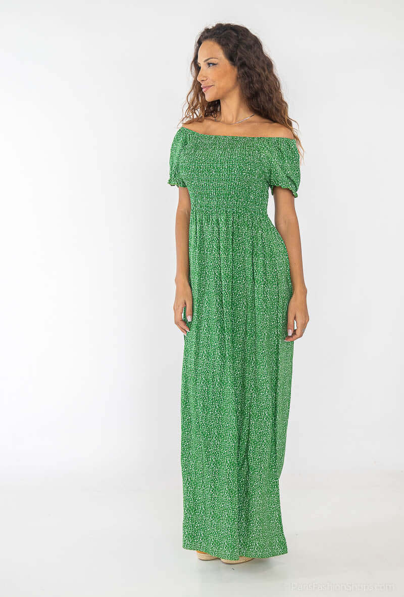 Vestido Fruncido Estampado PortugalUn vestido muy versatil para una mujer sofisticada. Este vestido largo con escote bardot y corte fruncido en la parte superior del top, junto a una falda larga y holgada, te hará lucir elegante y exclusiva. Hecho con 95%