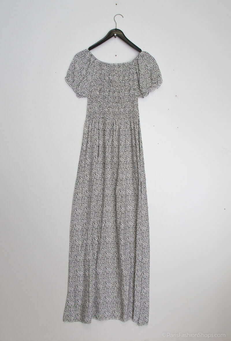 Vestido Fruncido Estampado PortugalUn vestido muy versatil para una mujer sofisticada. Este vestido largo con escote bardot y corte fruncido en la parte superior del top, junto a una falda larga y holgada, te hará lucir elegante y exclusiva. Hecho con 95%