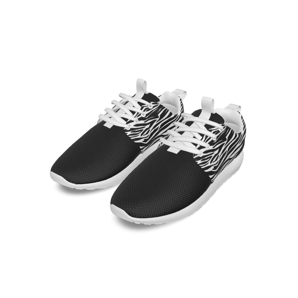 Zapatillas Running T.O.S.- Colección Zebra Lovers- Tallas 35/45Deportivas unisex animal print cebra. Parte superior de malla transpirable; Tela suave y transpirable. La parte superior está hecha de malla y la suela está hecha de EVA. Antideslizante, liger