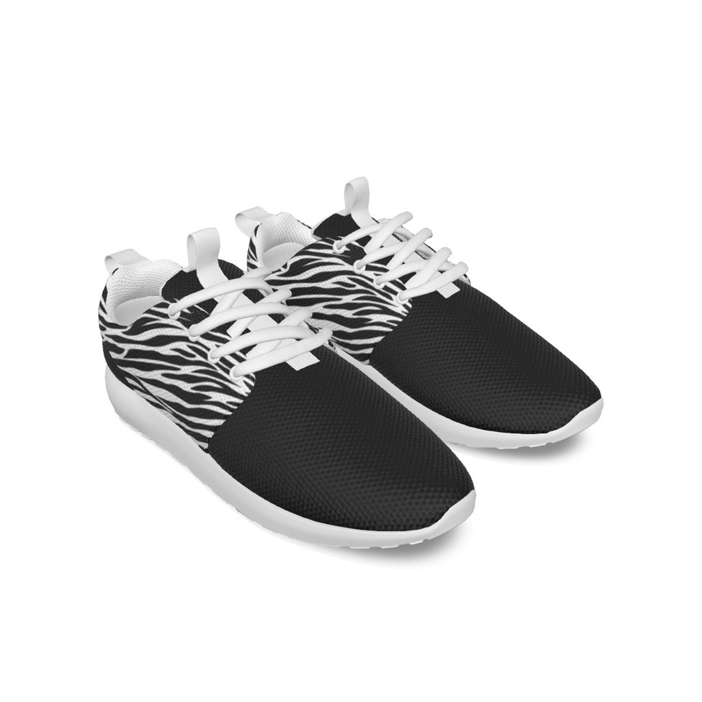 Zapatillas Running T.O.S.- Colección Zebra Lovers- Tallas 35/45Deportivas unisex animal print cebra. Parte superior de malla transpirable; Tela suave y transpirable. La parte superior está hecha de malla y la suela está hecha de EVA. Antideslizante, liger
