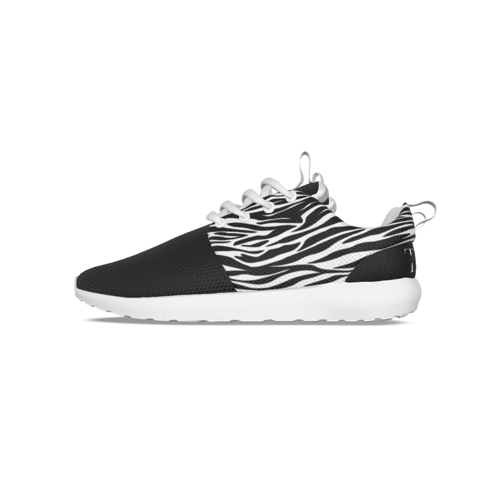 Zapatillas Running T.O.S.- Colección Zebra Lovers- Tallas 35/45Deportivas unisex animal print cebra. Parte superior de malla transpirable; Tela suave y transpirable. La parte superior está hecha de malla y la suela está hecha de EVA. Antideslizante, liger