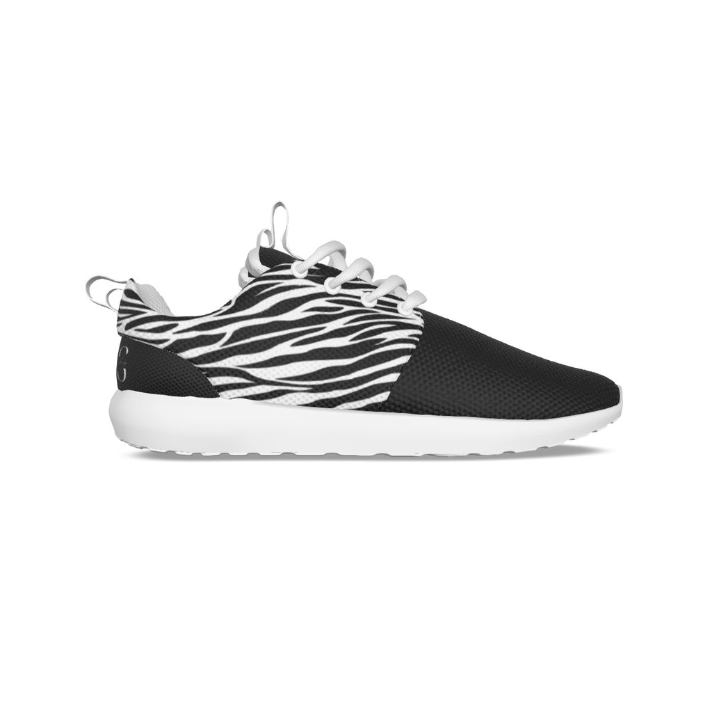 Zapatillas Running T.O.S.- Colección Zebra Lovers- Tallas 35/45Deportivas unisex animal print cebra. Parte superior de malla transpirable; Tela suave y transpirable. La parte superior está hecha de malla y la suela está hecha de EVA. Antideslizante, liger