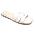 Sandalias cruzadas eco piel blancoSandalias planas blancas eco piel Que llegue el buen tiempo y nos encuentre bien calzadas! Fabulosas y cómodas sandalias blancas con suela antideslizante. El fondo de armario perfecto, en cuanto a calzado de verano se ref