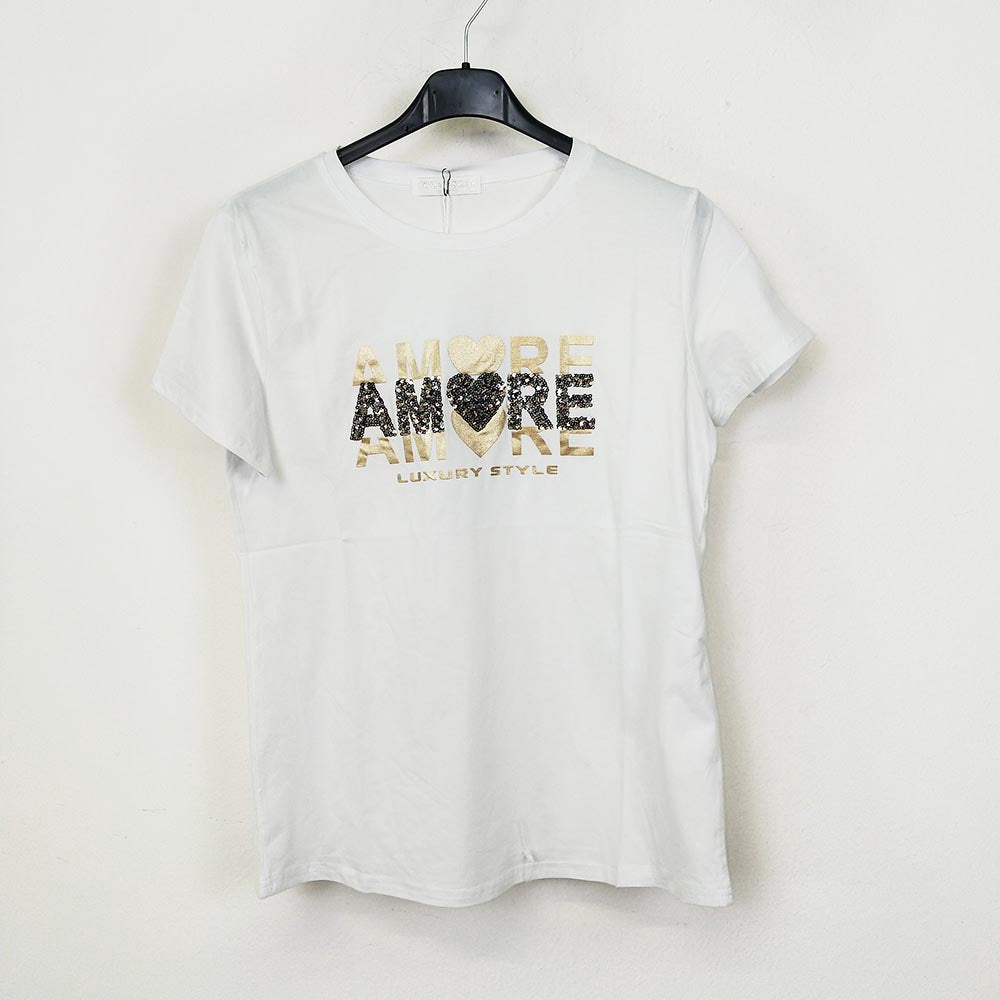 Camiseta algodón mujer Amore | Varios ColoresCamiseta algodón estampada Corazón Brilla con estilo y comodidad! Claro que si! Con nuestra camiseta de algodón estampada, podrás seguir activa día a día a la vez que confortable, ya que el algodón permite que