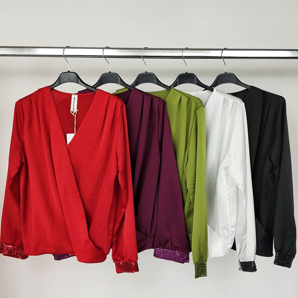 Blusa Cruzada Lentejuelas | Pailletten Damen BluseBlusa cruzada con lentejuelas Camisa clásica con escote cruzado y detalle de lentejuelas en los puños. Goma en la cinturilla, en la parte trasera, para un ajuste y comodidad únicos! Talla unica S/L (36/40)