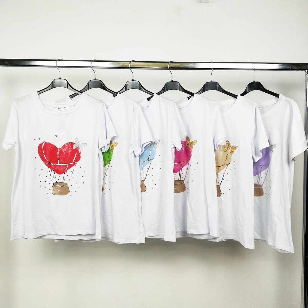 Camiseta algodón mujer Corazon/ Mariposa | Varios ColoresCamiseta algodón estampada Corazón Cómoda y brillante al mismo tiempo? Claro que si! Con nuestra camiseta de algodón estampada, podrás seguir activa día a día a la vez que confortable, ya que el alg
