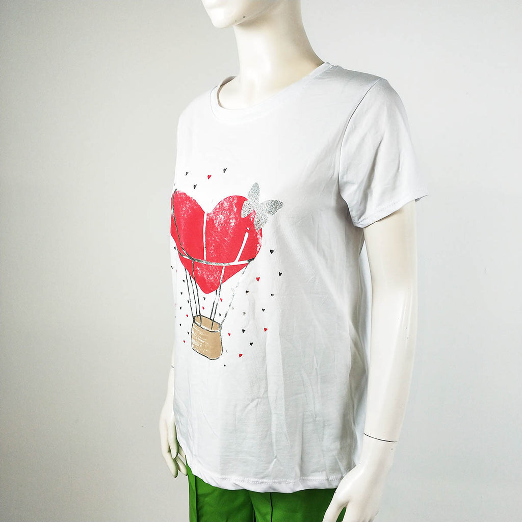 Camiseta algodón mujer Corazon/ Mariposa | Varios ColoresCamiseta algodón estampada Corazón Cómoda y brillante al mismo tiempo? Claro que si! Con nuestra camiseta de algodón estampada, podrás seguir activa día a día a la vez que confortable, ya que el alg