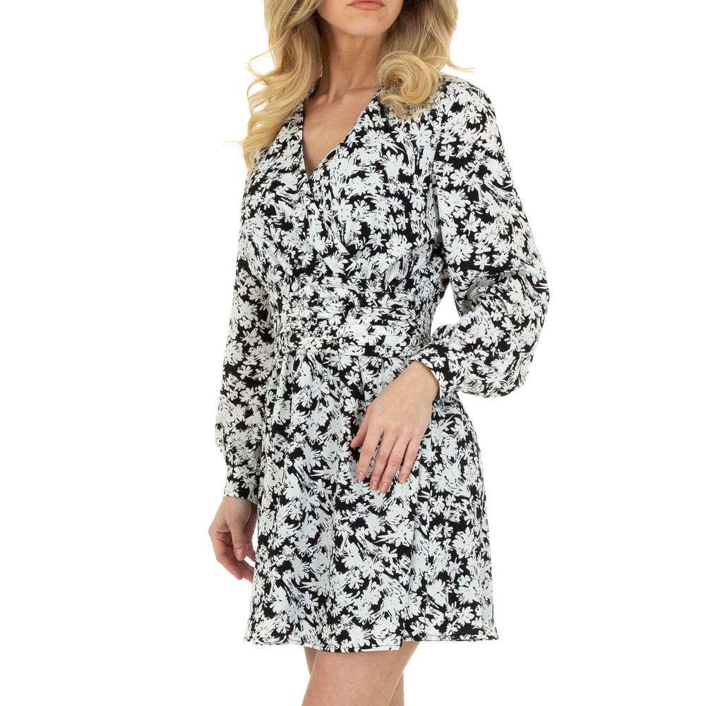 Vestido Palm BeachVestido estampado Palm Beach Estampado con tela efecto tul, con pequeños hilos finos dorados como decoración especial. Este delicado vestido es perfecto para diario o para ocasiones mas especiales. Escote en V cruzado. Cremallera lateral